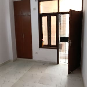 Building - 2 BHK Builder Floor for Rent in Rohini Sector 24, Delhi | Road View | ₹22,000/Month